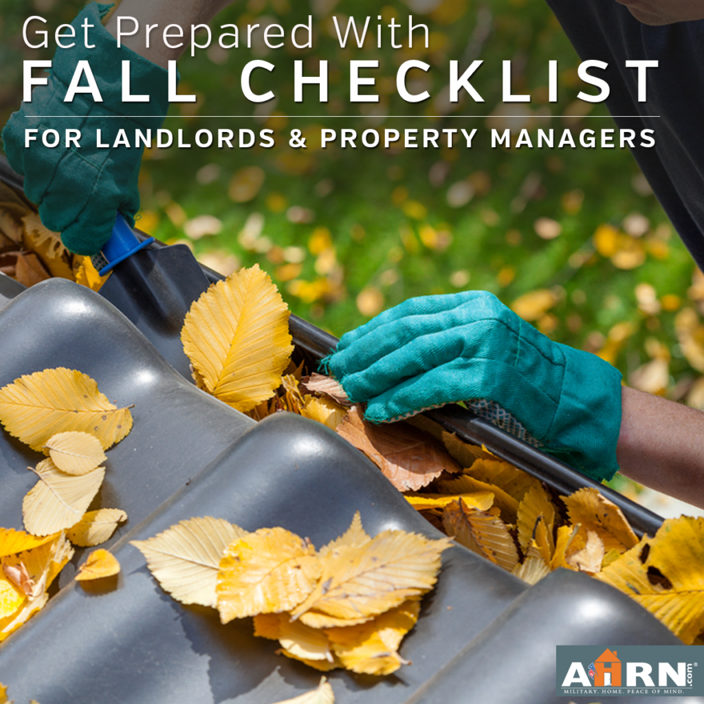 Yellow leaves being scooped out of a gutter