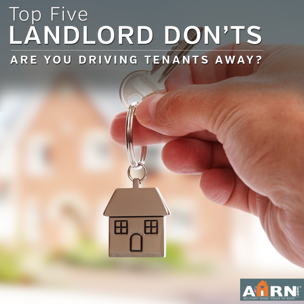 A key with a keychain of a home attached